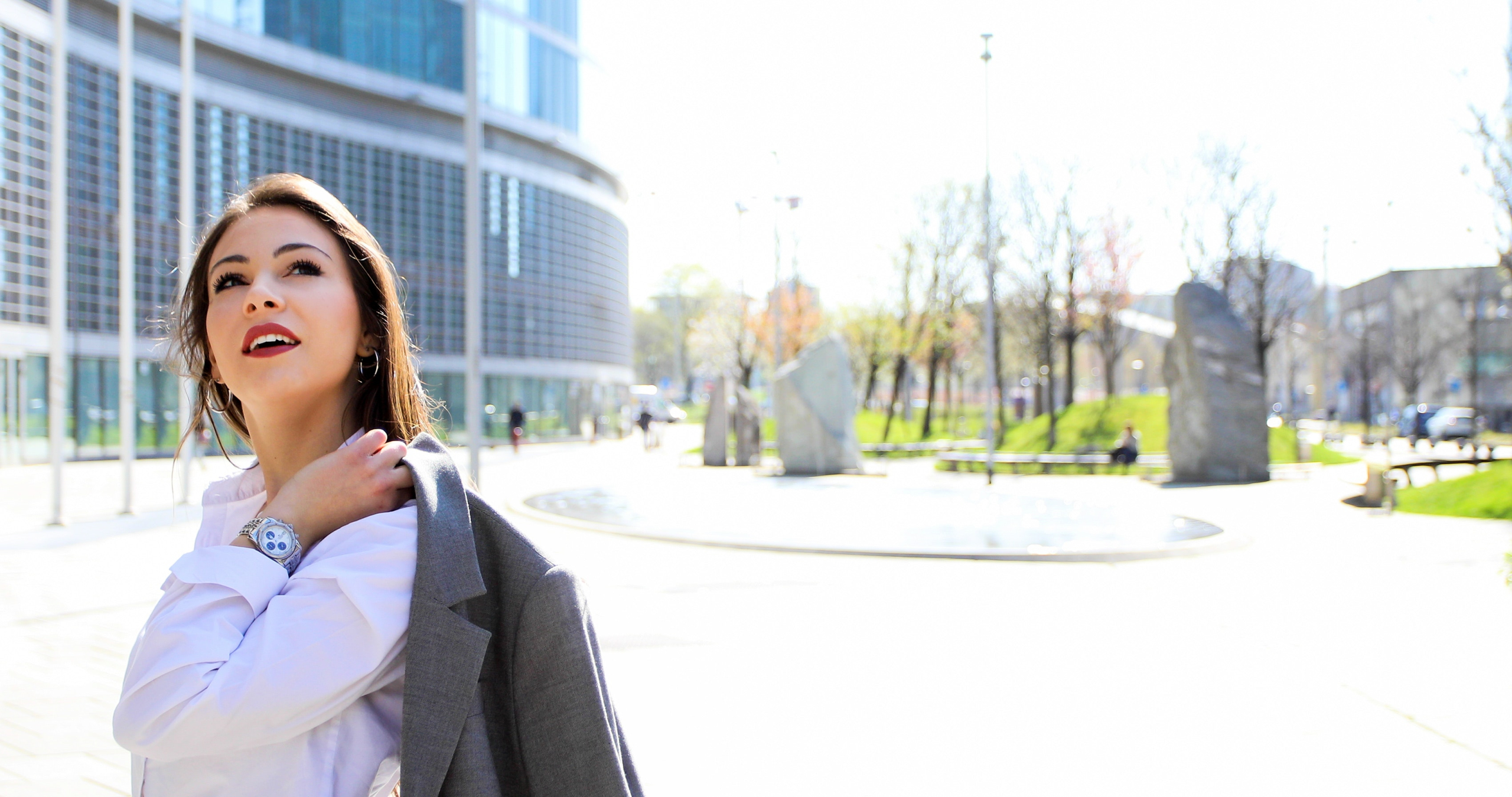 Woman carrying blazer
